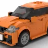 LEGO BMW 2 Series Active Tourer scale model in orange color on white background