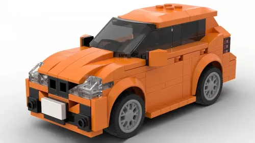 LEGO BMW 2 Series Active Tourer scale model in orange color on white background
