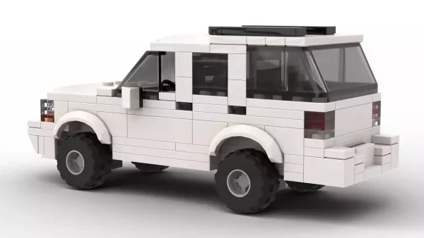 LEGO Oldsmobile Bravada 99 model on white background rear view angle